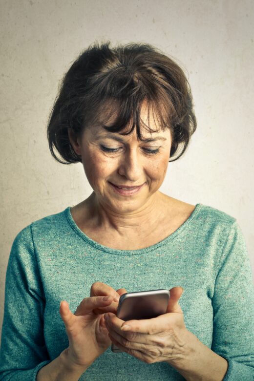 Photo: Older woman on cell phone