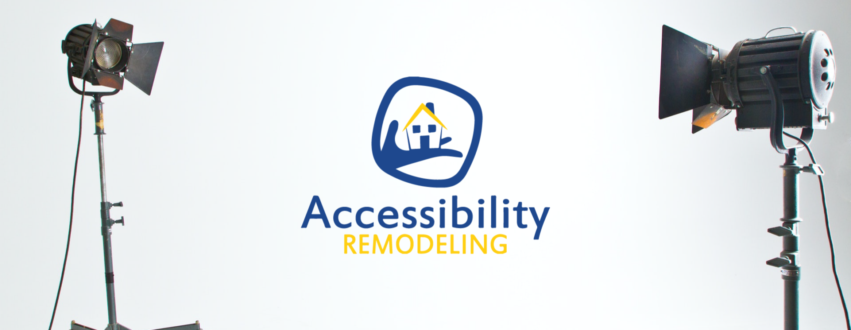 Two spotlights focused on the Accessibility Remodeling logo