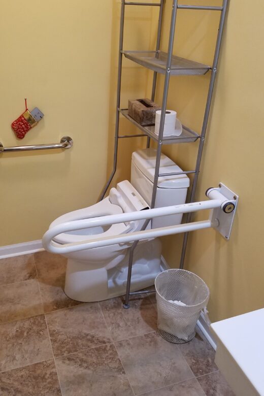 Photo: Accessible toilet with bidet and grab bars
