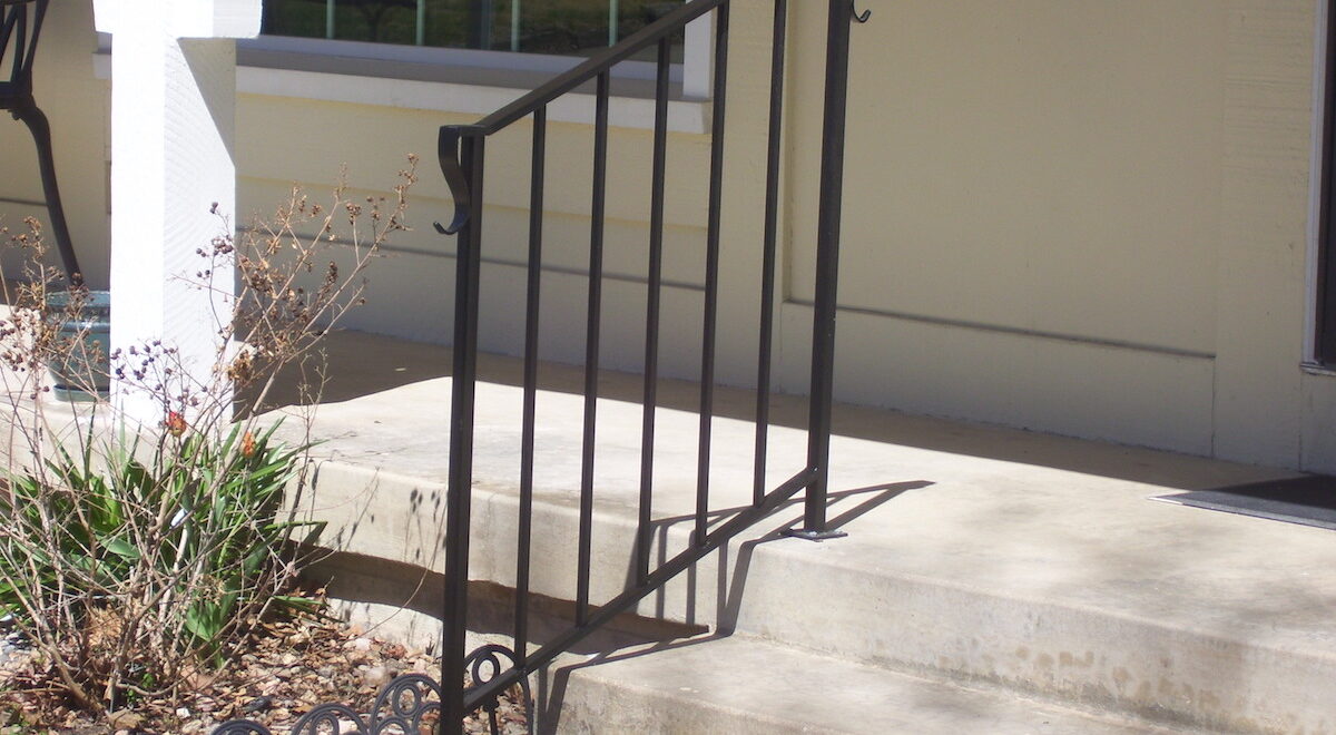 Photo: Metal Handrails installed by Accessibility Remodeling